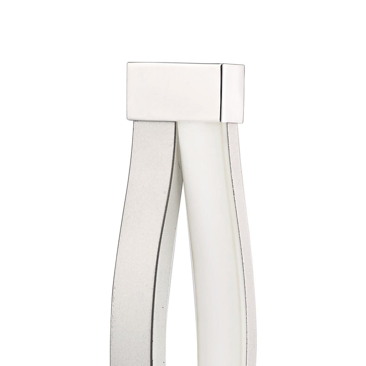 Close-up of the Sahara LED Table Lamp 6W 3000K in Silver & Chrome, featuring a sleek, minimalist design with polished metal details and curved lines, reflecting modern aesthetics.