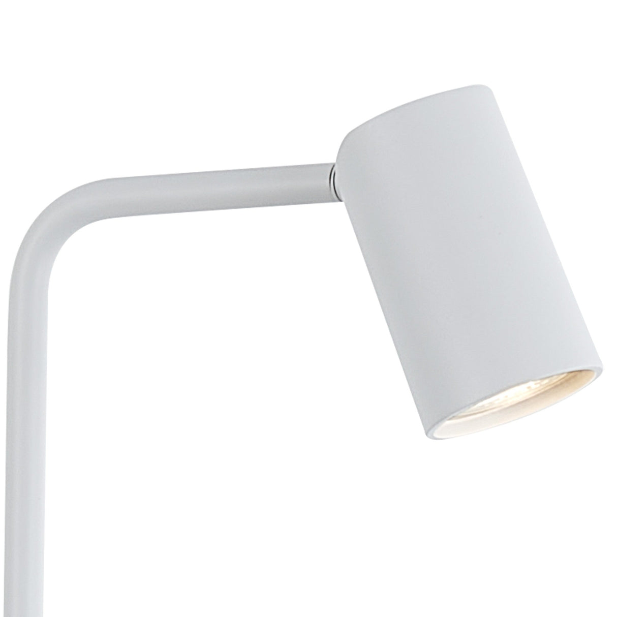 A close-up of the Sal 1 Light Floor Lamp in matt white, featuring a modern cylindrical spotlight on a curved metal arm, illuminated and emitting light.