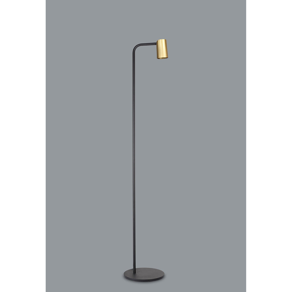 The Sal 1 Light Floor Lamp - Satin Gold & Matt Black features a slim black stand, round base, and a small cylindrical gold shade, shown against a plain gray background and inspired by contemporary design.