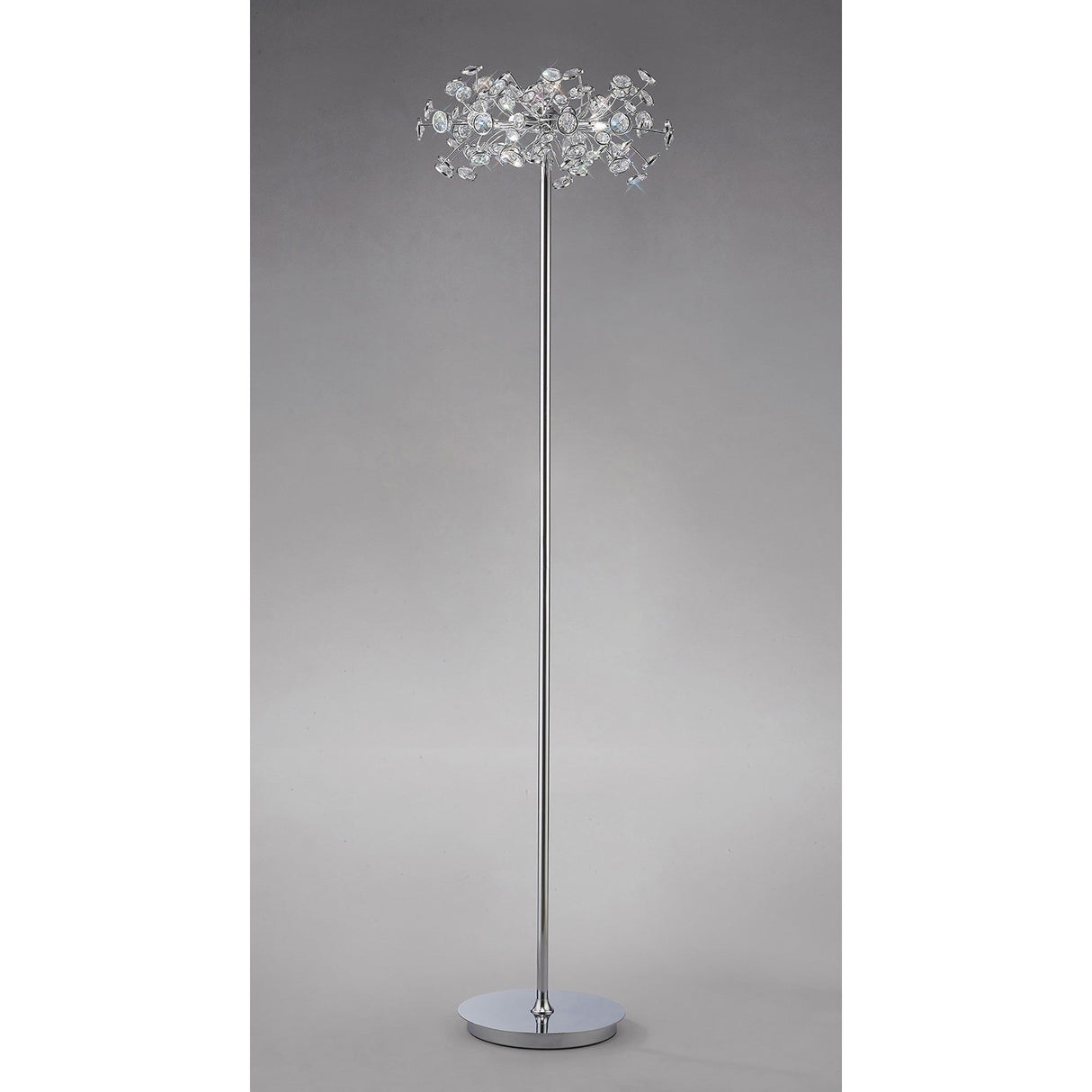 The Savanna 3 Light Crystal Floor Lamp in polished chrome features a tall, modern design with a shiny base and pole, topped by a decorative cluster of clear crystals that resemble delicate flowers or branches.