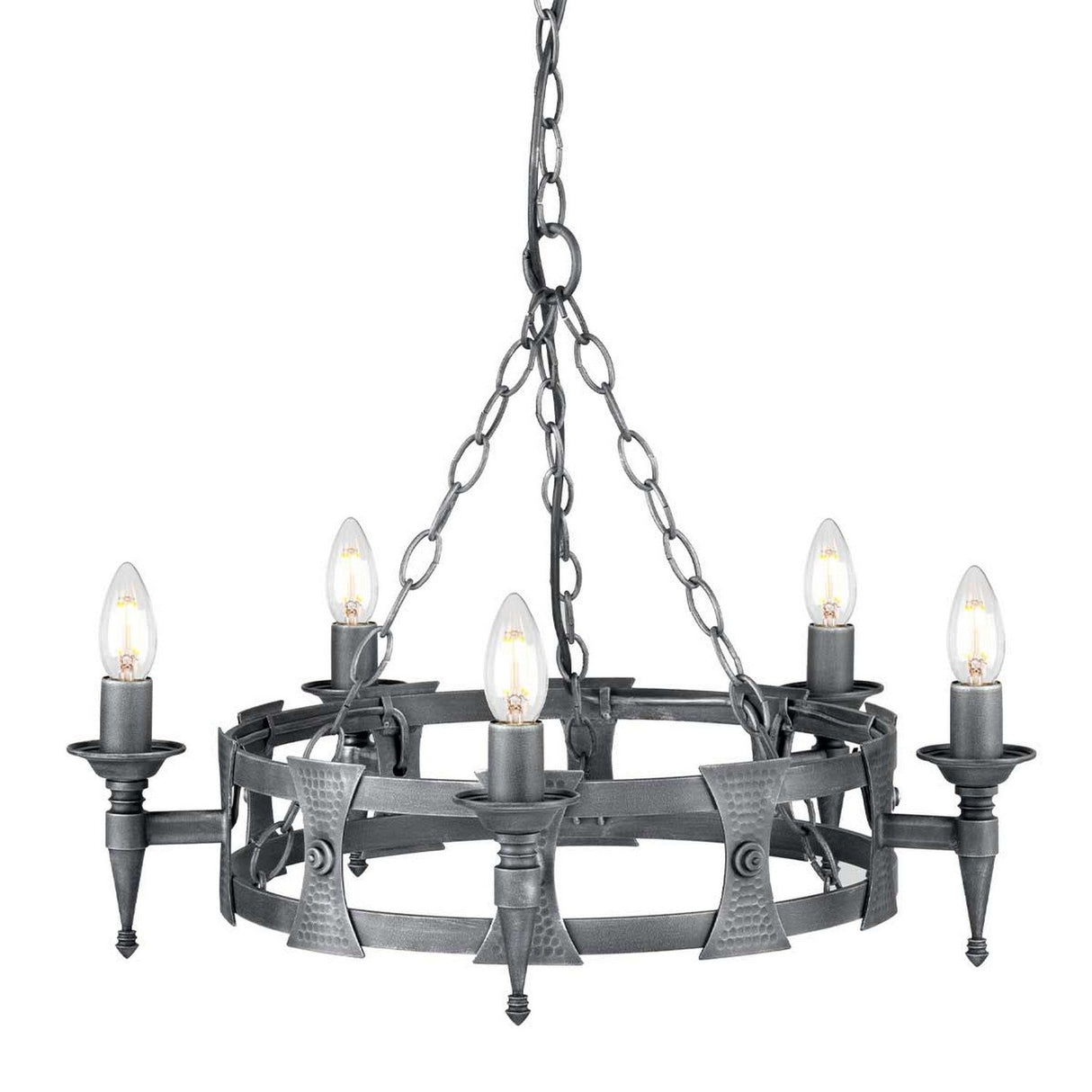 The Saxon 5 Light Chandelier - Black/Silver Patina showcases a rustic design with its circular wrought iron frame and five candle-shaped light bulbs. The black finish is accentuated by a delicate silver patina and arrow-like decorative details. This elegant fixture is suspended gracefully by a chain, bringing timeless charm to any space.