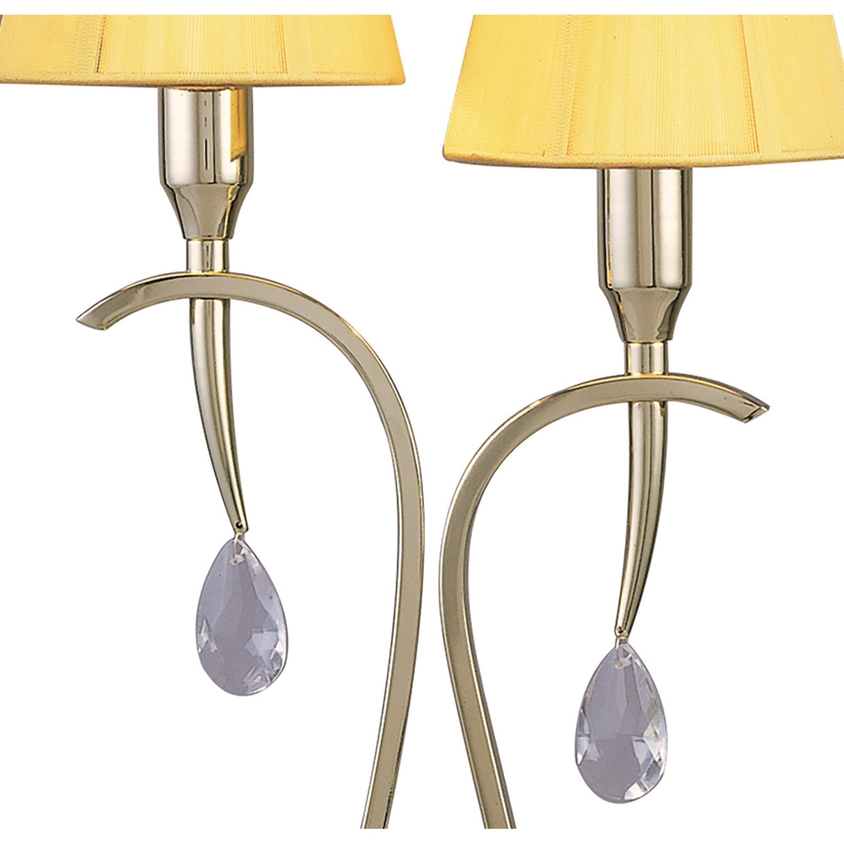 The Siena 2 Light Crystal Table Lamp features a polished brass base, curved arms, amber shades, and hanging teardrop crystals for elegant ambient lighting.
