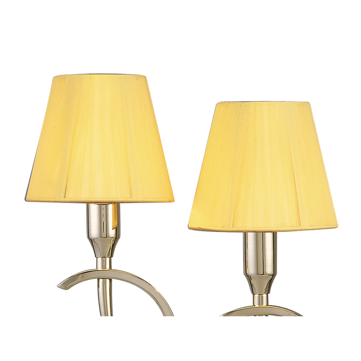 The Siena 2 Light Crystal Table Lamp features a polished brass base and amber shades, providing soft, warm ambient lighting ideal for a cozy atmosphere. Set of two lamps shown against a white background.