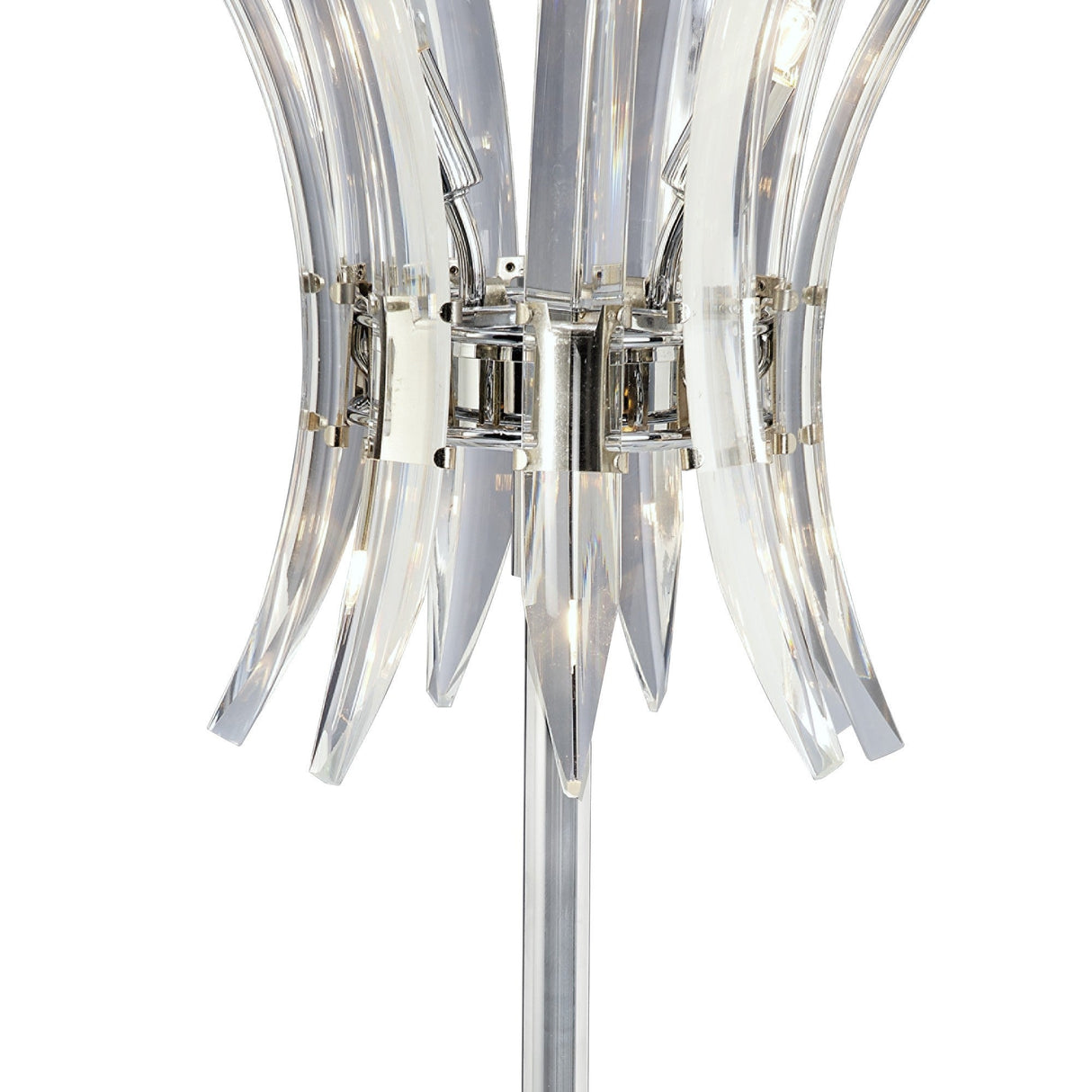 A close-up of the Sinclair 4 Light Crystal Table Lamp in polished chrome, featuring curved clear acrylic panels in a flower-like pattern around a central chrome base, softly illuminating its contemporary design.