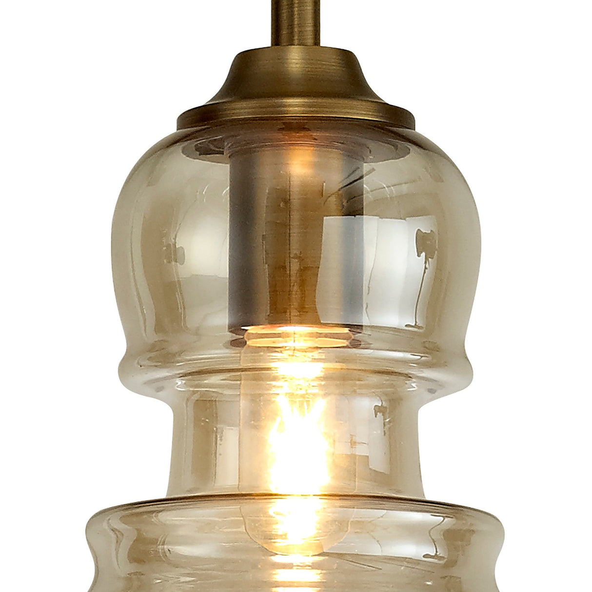 Close-up of the Mantra Sonata 1 Light Glass Pendant in bronze-tinted glass with a double-gourd shade, antique brass rod, and illuminated E27 bulb.