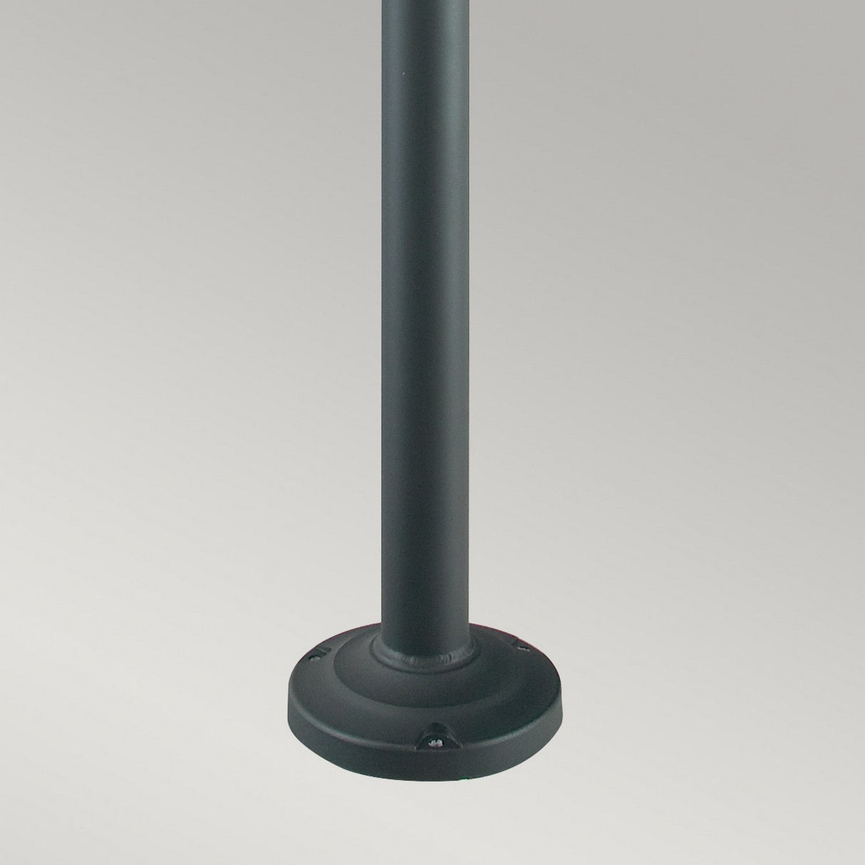 The Stockholm 1 Light Grande Lamp Post - Black stands elegantly against a neutral gray background, embodying Scandinavian design's minimalist aesthetic.