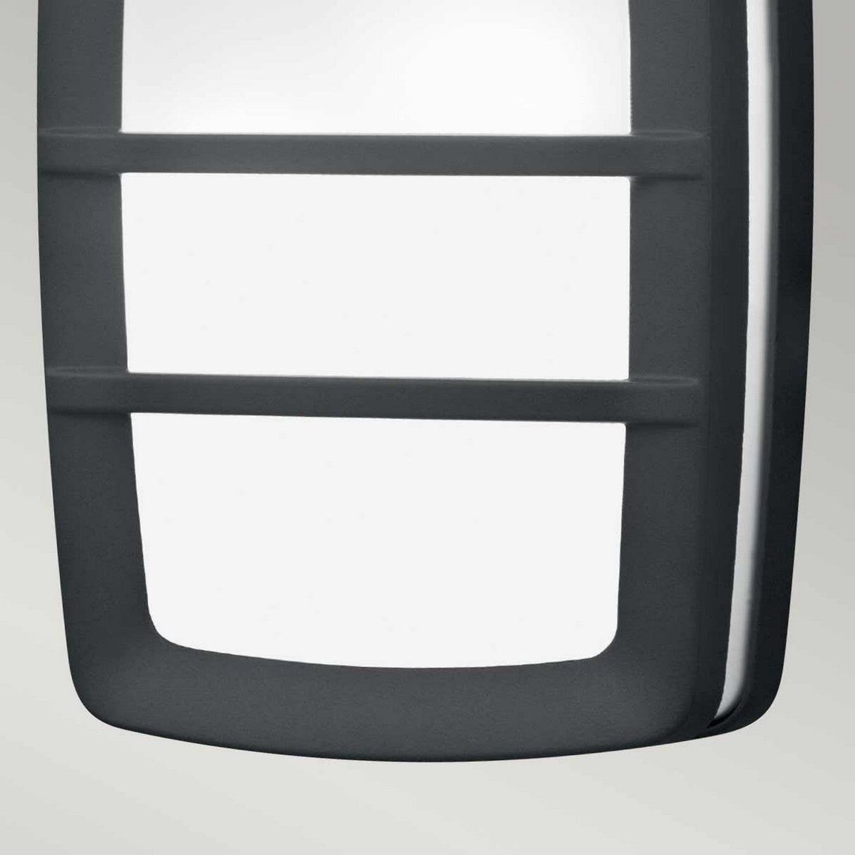 A close-up view of the Sven 2 Light Outdoor Wall/Ceiling Light - Graphite features a sleek, rectangular design with a black frame and two horizontal bars made from die-cast aluminum, showcased against a light gray backdrop.