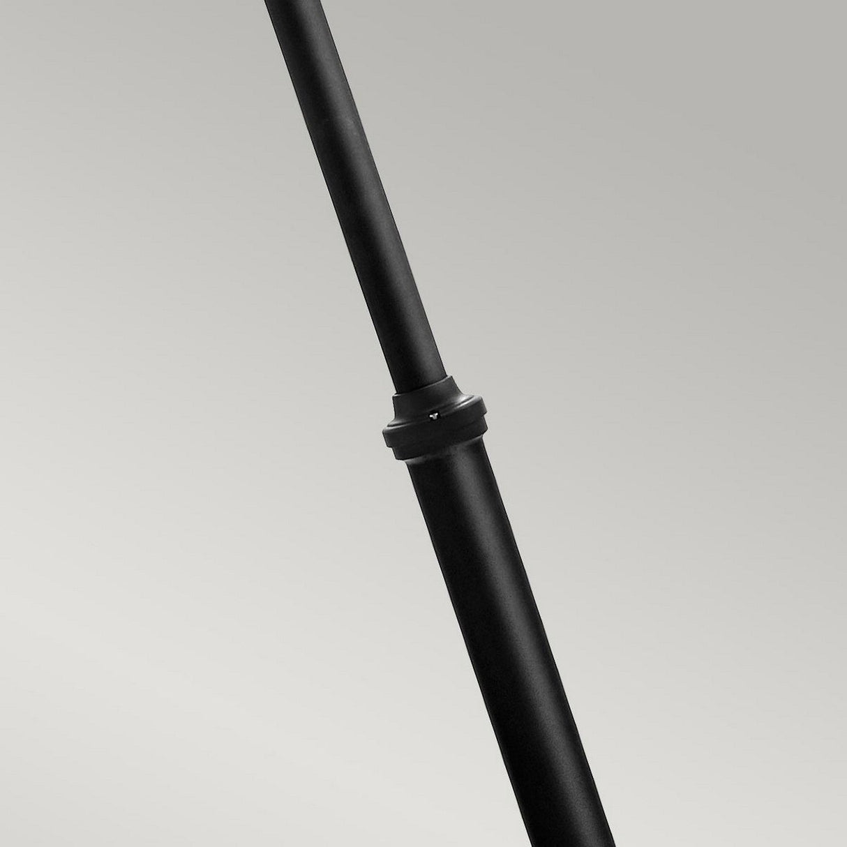 Close-up of a Turin 2 Light Twin Lamp Post - Black, featuring a telescopic rod with an adjustable lock, crafted from die-cast aluminium, against a light gray background.