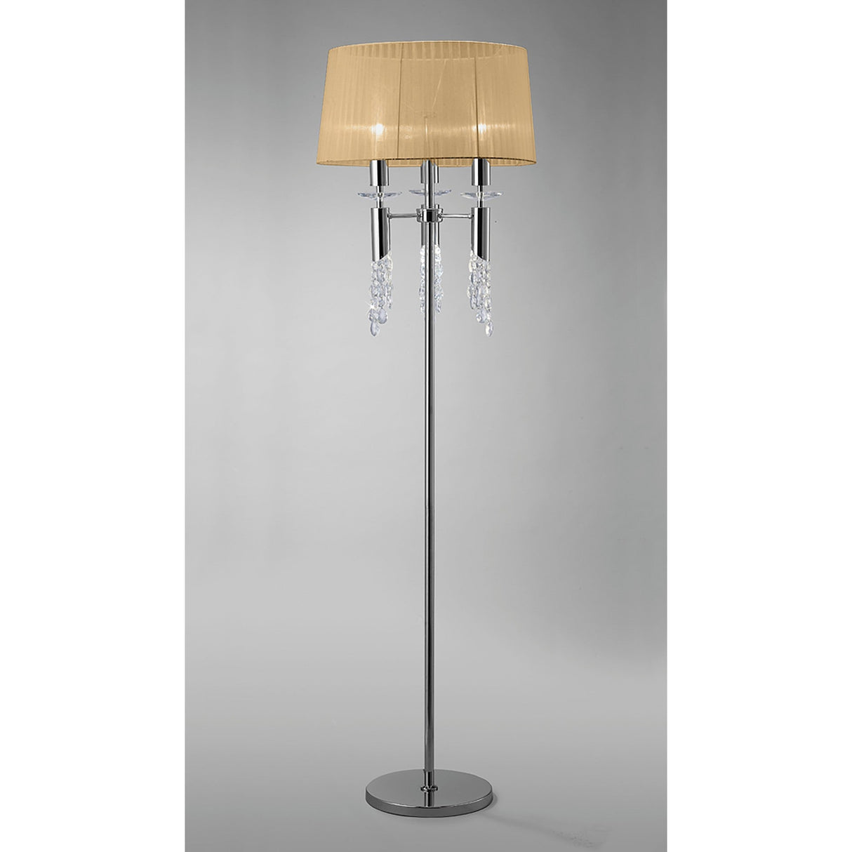 The Tiffany 6 Light Crystal Floor Lamp features a shiny chrome stand, a round bronze shade, and crystal-like accents hanging below the shade, displayed against a plain gray background.