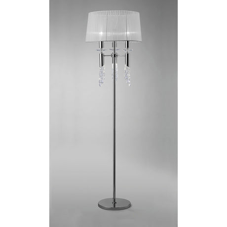 The Tiffany 6 Light Crystal Floor Lamp features a polished chrome base, slim pole, white drum shade, and decorative hanging crystal accents for an elegant touch.