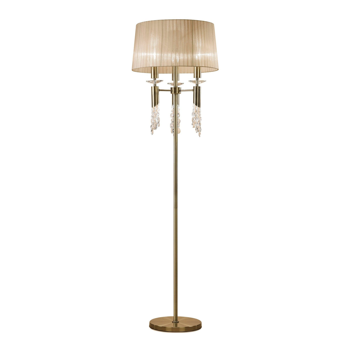 The Tiffany 6 Light Crystal Floor Lamp features a brass finish, bronze shade, round base, slender pole, and elegant hanging crystal accents. When lit, it emits a warm, inviting light perfect for any space.