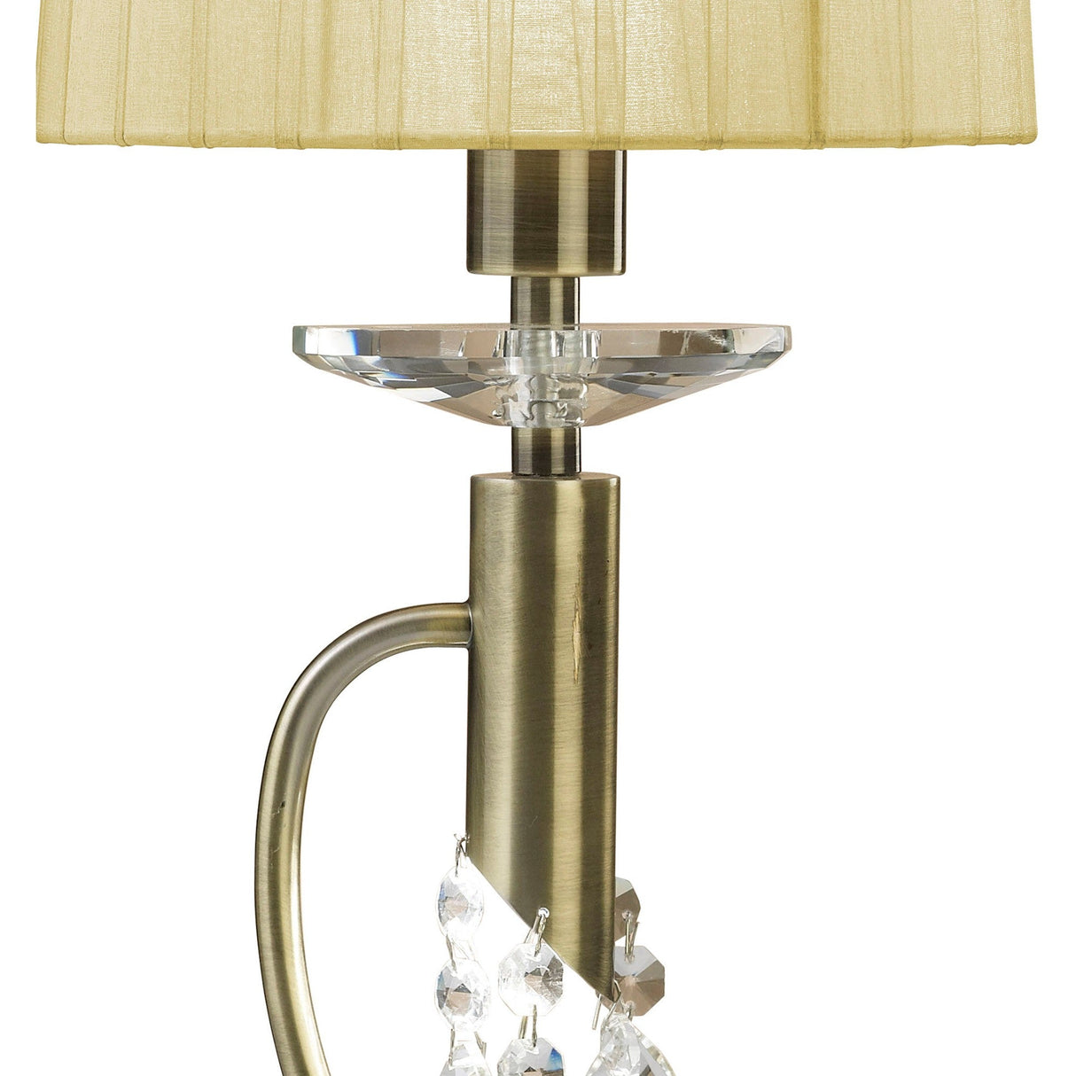 A close-up of the Tiffany 2 Light Crystal Table Lamp, featuring a brass base, cream pleated shade, clear crystal accents, and hanging crystal decorations.