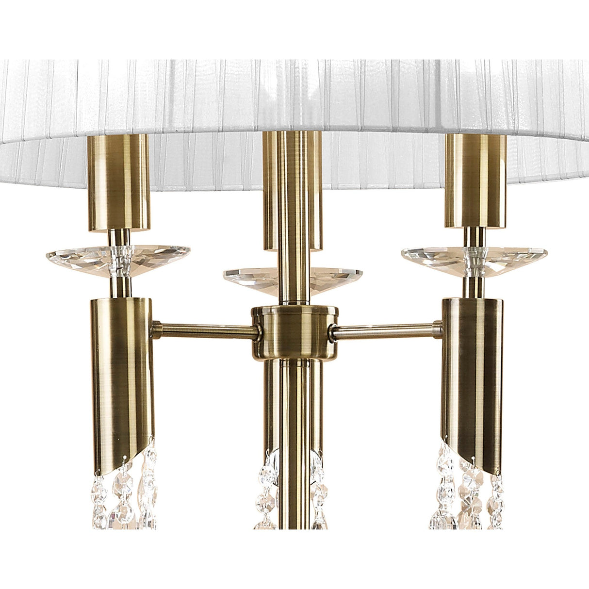 Close-up of the Tiffany 6 Light Crystal Floor Lamp in brass with a white shade, featuring three candle-style arms, crystal accents, and decorative glass elements for an elegant modern look.
