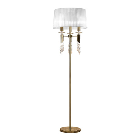 The Tiffany 6 Light Crystal Floor Lamp features a brass base and pole, white pleated shade, and elegant hanging crystal accents for a stylish, sophisticated look.