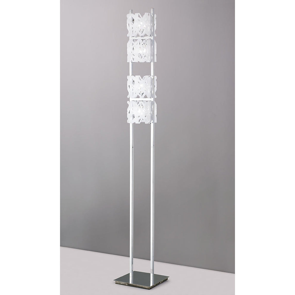 The Tokio 4 Light Floor Lamp - Gloss White & Polished Chrome showcases tall chrome poles and stacked white shades on a sleek base, offering striking modern lighting for your space.