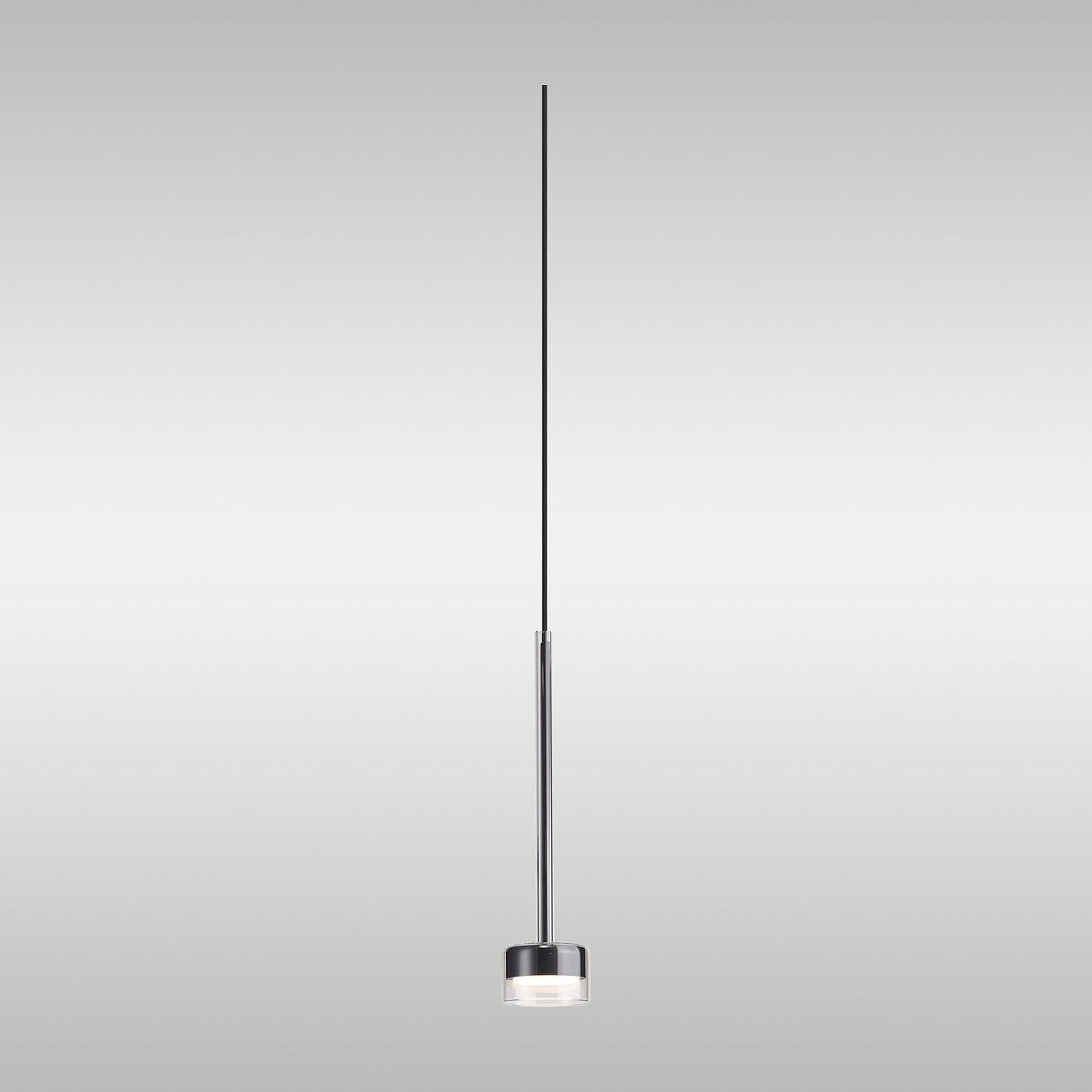 Mantra Tonic dimmable LED pendant light with chrome cap and clear glass shade on a slim cable, shown against a light grey background.