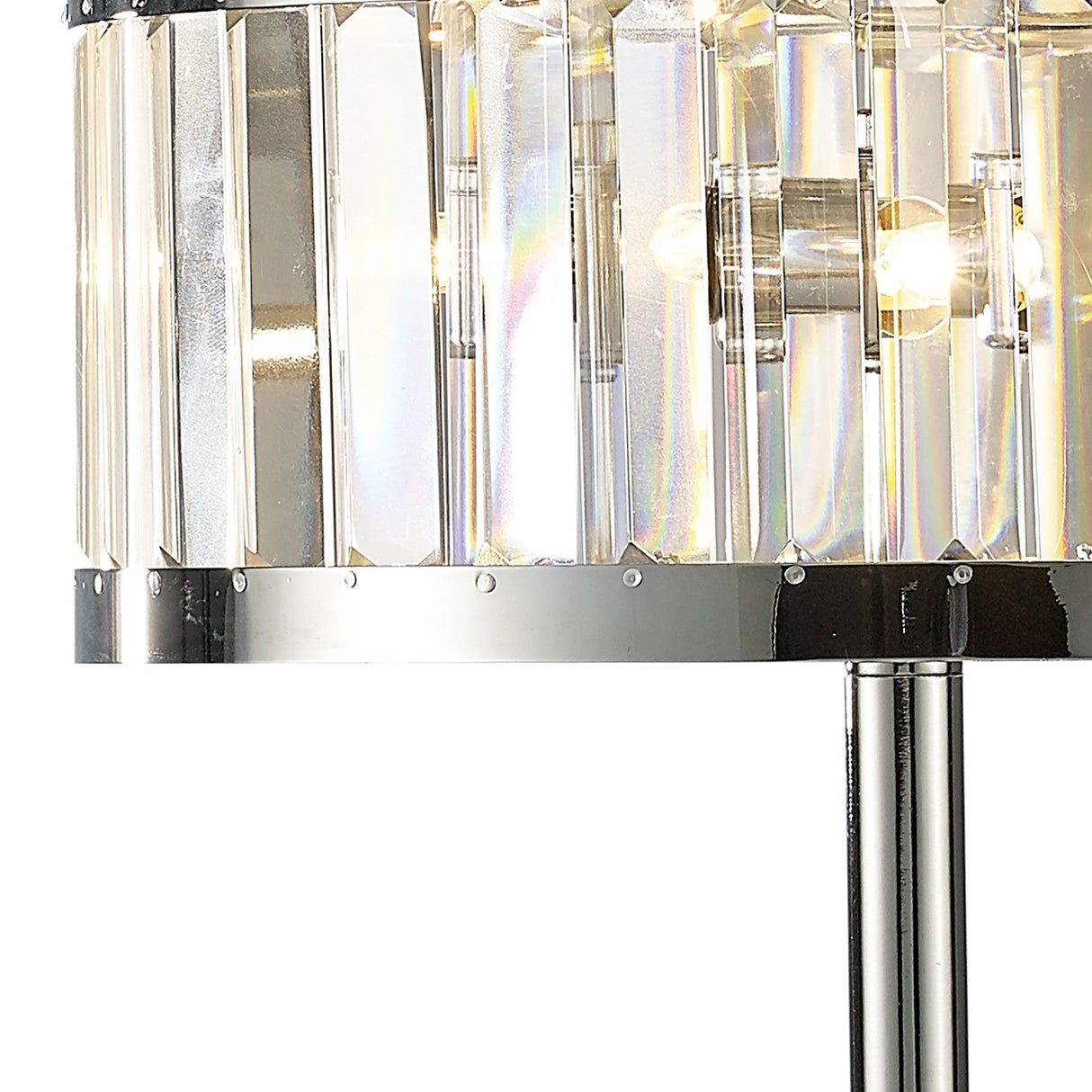 Close-up of the Torre 3 Light Crystal Table Lamp in polished chrome, featuring a cylindrical shade with clear vertical glass panels and visible light bulbs inside.