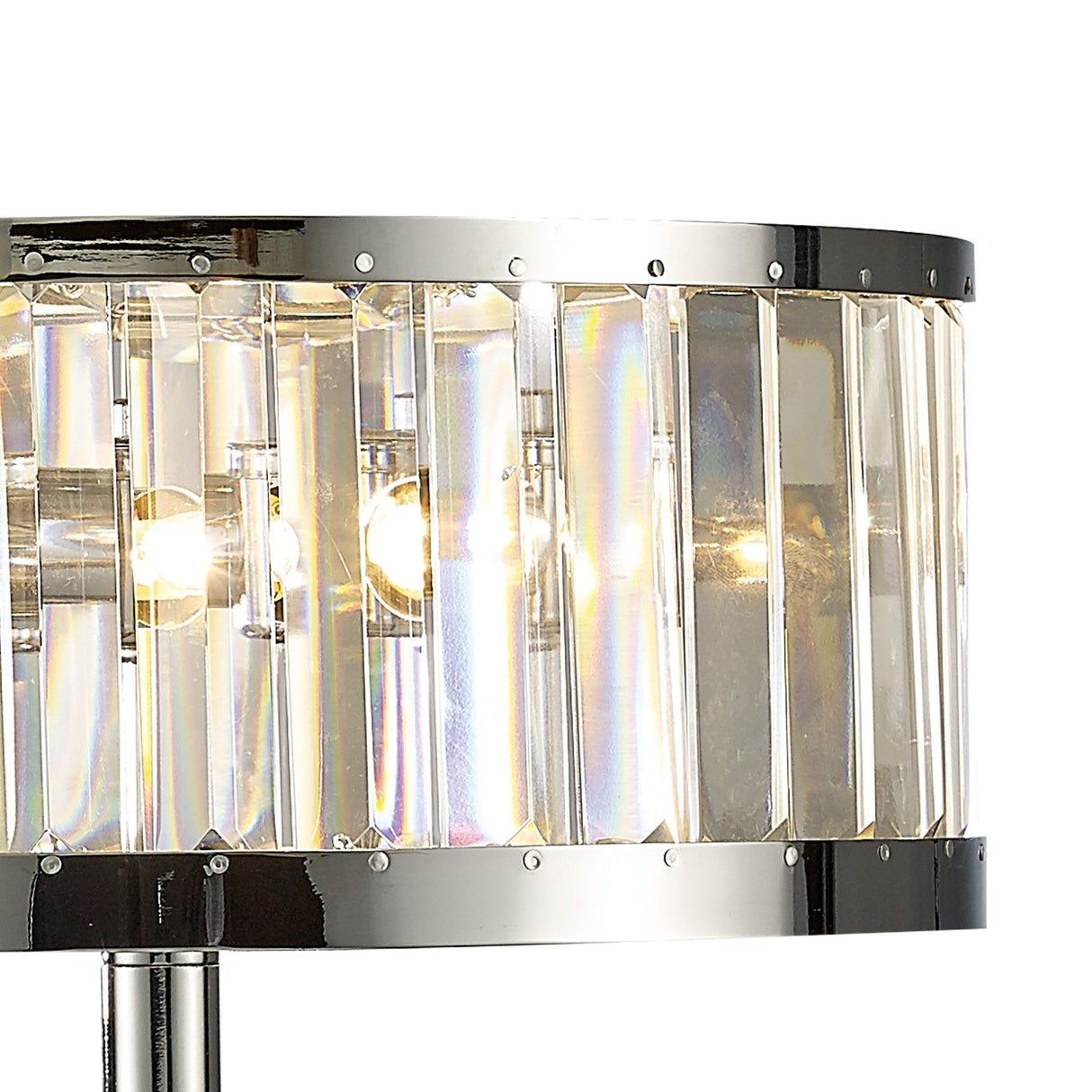 Close-up of the Torre 3 Light Crystal Table Lamp in polished chrome, featuring a cylindrical shade with clear vertical glass panels and two exposed glowing bulbs inside.