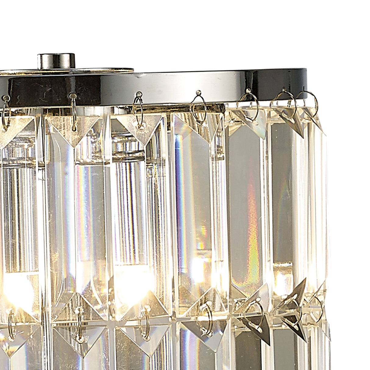 Close-up of the Torre 3 Light Crystal Curtain Table Lamp in polished chrome, featuring cascading rectangular crystal prisms that reflect and refract light for a shimmering, elegant, and luxurious effect.