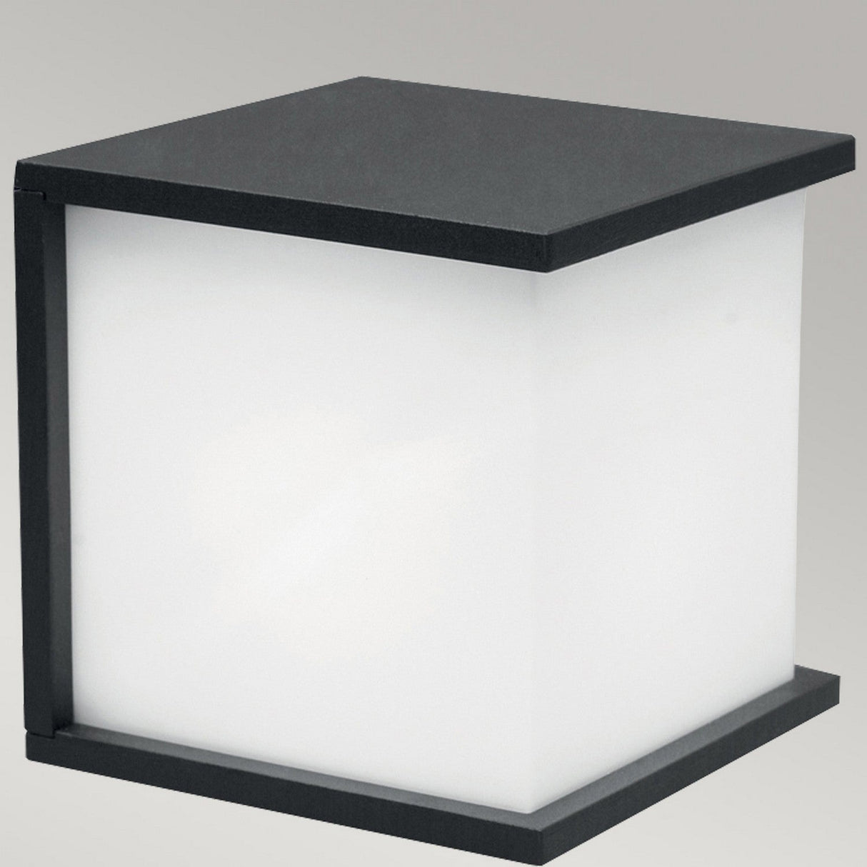 Introducing the Torsten 1 Light Outdoor Wall Fitting in Graphite, a minimalist cube-shaped wall sconce that features a frosted white diffuser and sleek black edges against a gray background. Its weather-resistant design ensures both durability and performance, making it a stylish and reliable choice for outdoor installations.