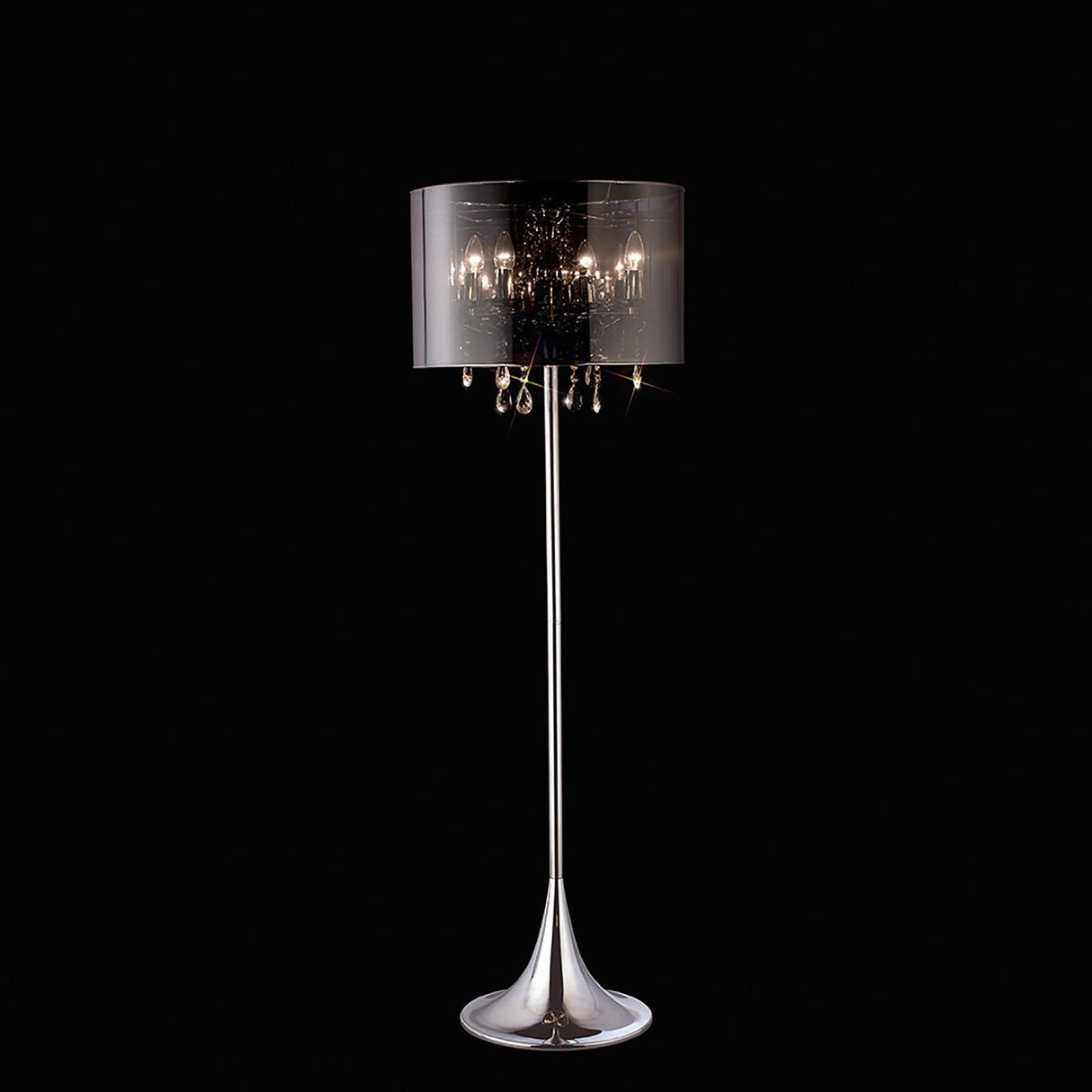 The Trace 4 Light Crystal Floor Lamp features a glossy chrome base and stand, a smoked chrome shade, and an inner chandelier with hanging crystal accents. The lamp is shown illuminated against a solid black background.