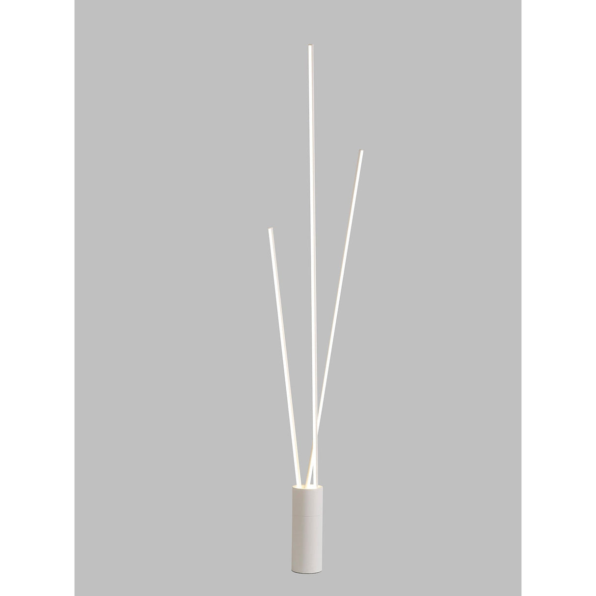 The Vertical Dimmable LED Floor Lamp 60W 3000K in white features a minimalistic cylindrical design with three slim, tall light bars, resembling a modern vase, set against a plain light grey background.