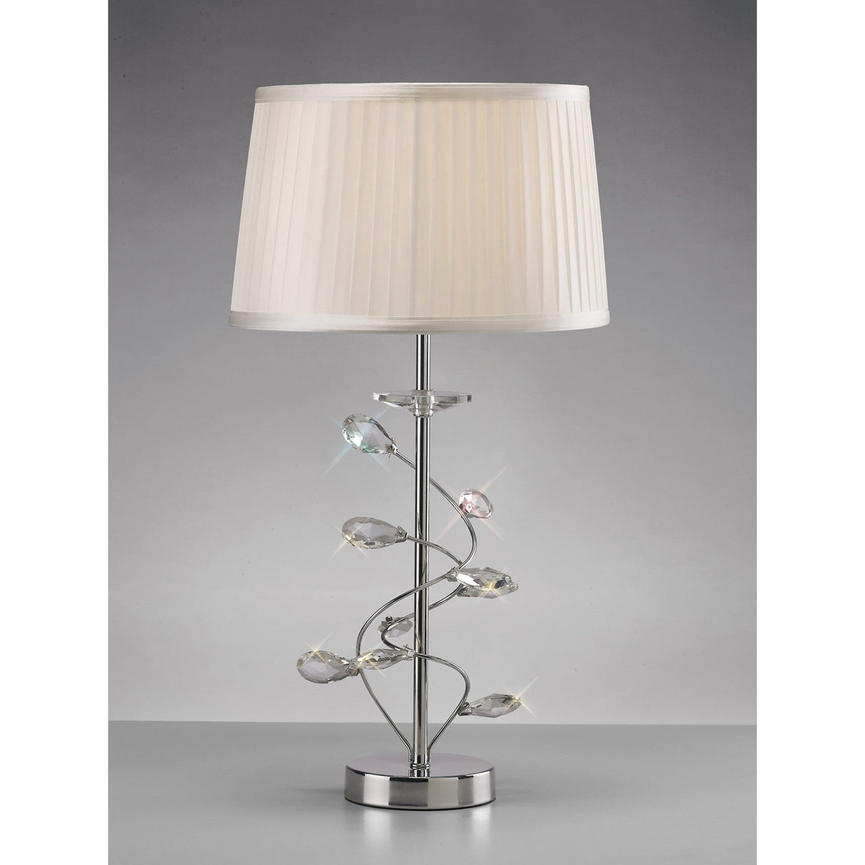 The Willow 1 Light Crystal Table Lamp features a chrome base, white pleated lampshade, and decorative crystal accents on elegant curved metal branches.