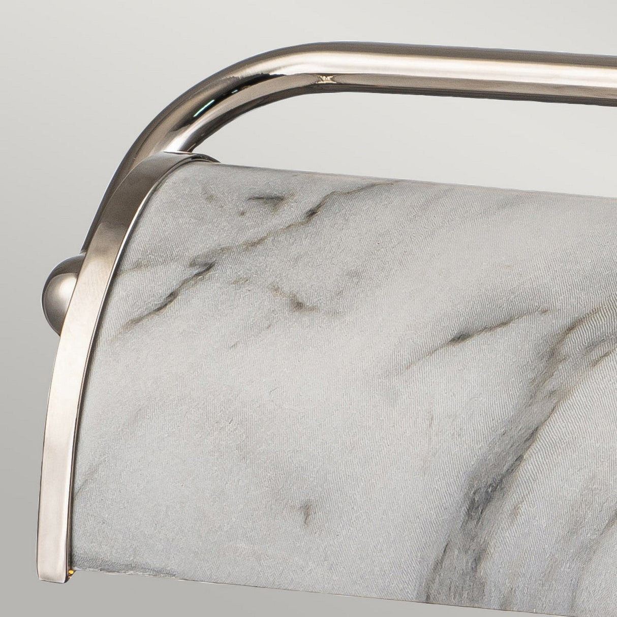 Close-up of the Winchfield 2 Light Medium Picture Light showcasing a white marble effect accented by a metal frame. The sleek, light gray marble design contrasts with polished nickel, offering a modern and elegant appearance.