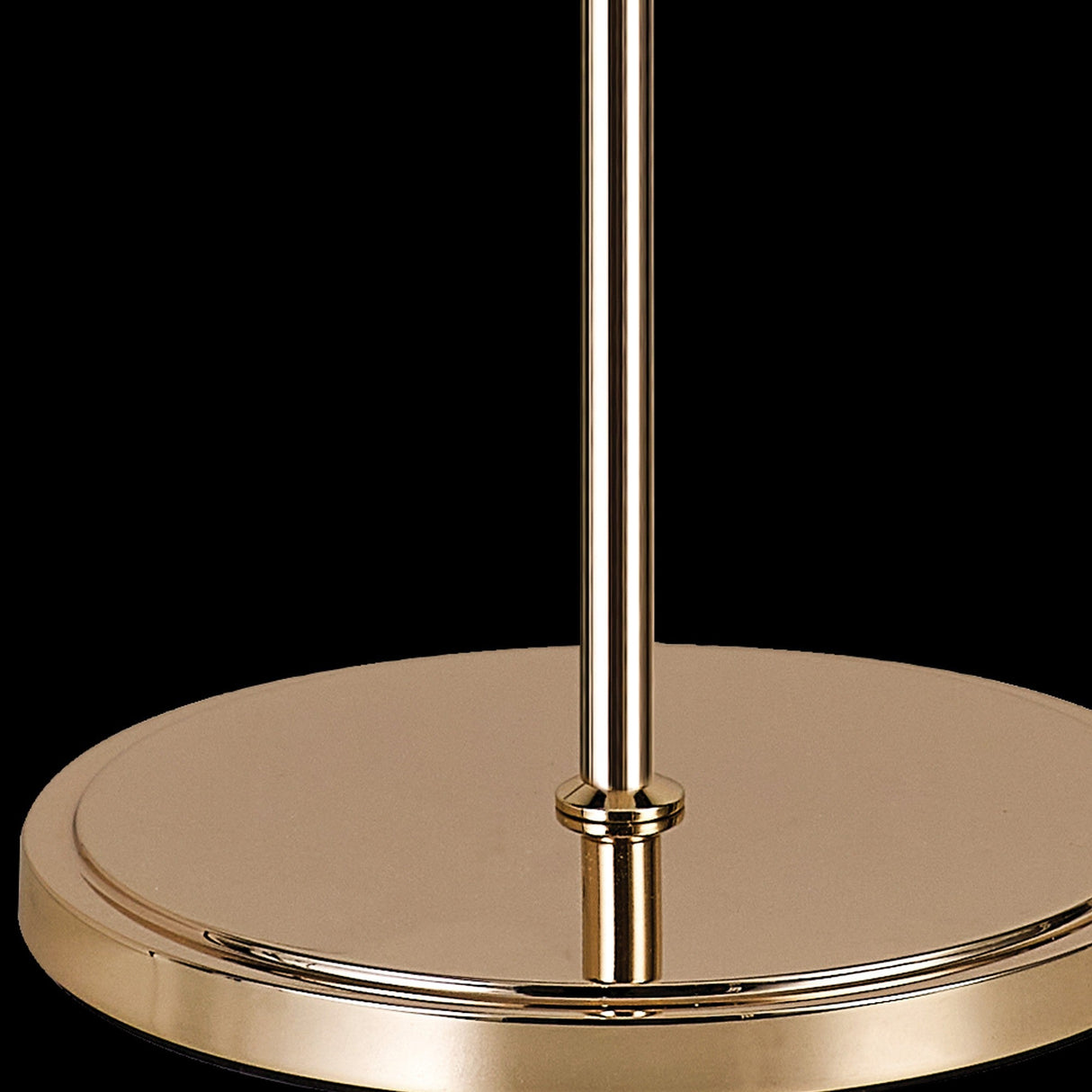 A close-up of the Wisteria 4 Light Crystal Floor Lamp’s round, shiny French gold base with a central vertical rod, set against a black background—ideal for adding ambient lighting to any space.