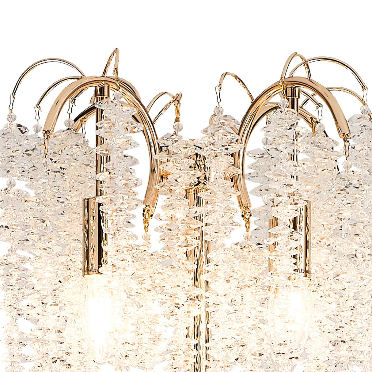 Close-up of the Wisteria 4 Light Crystal Floor Lamp in French Gold, featuring elegant metal arms and sparkling clear crystals that beautifully reflect light and enhance any room's ambiance.