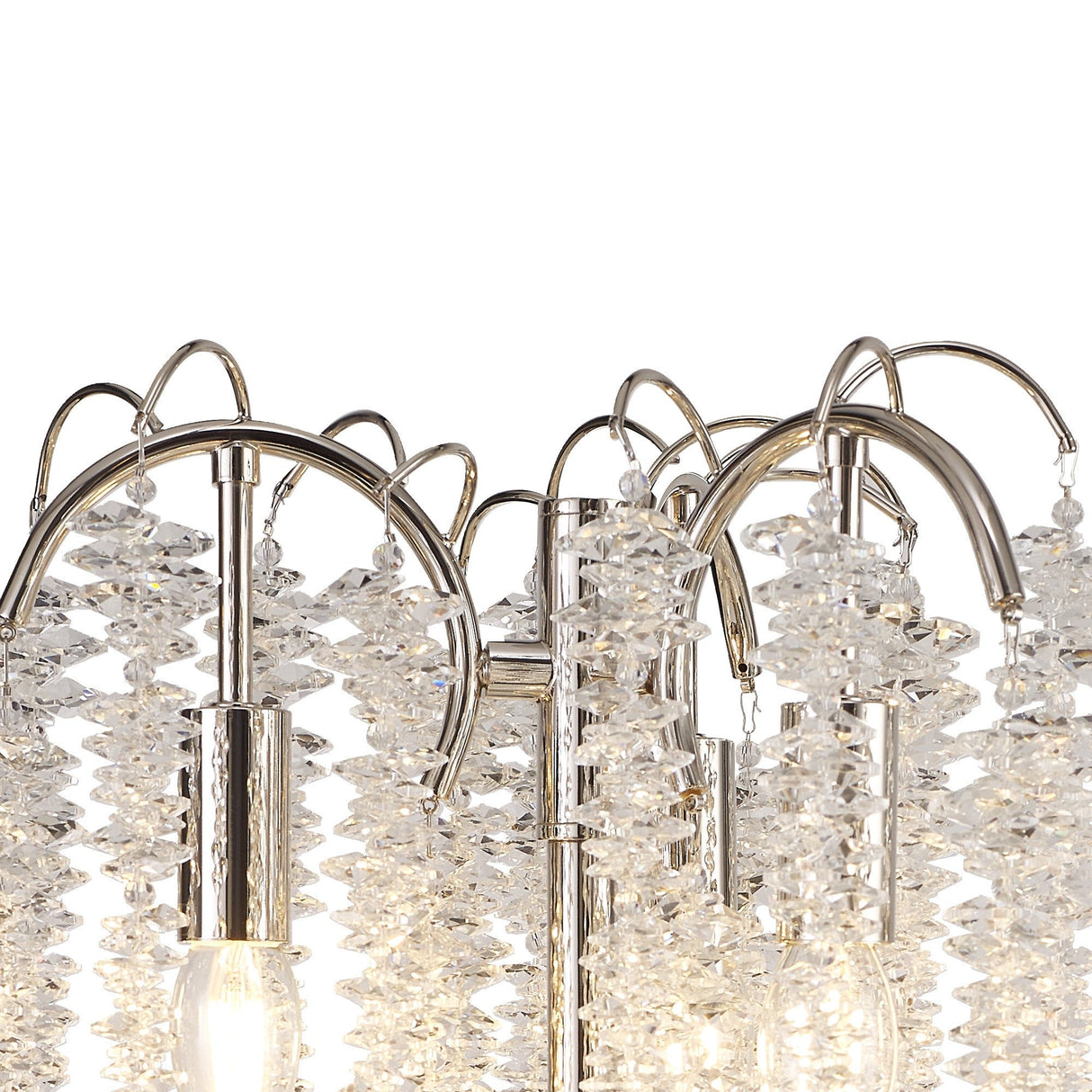 Close-up of the Wisteria 3 Light Table Lamp in nickel, featuring polished metal arches, clear crystal clusters, and partially visible bulbs for sparkling ambient lighting and an elegant, modern look.