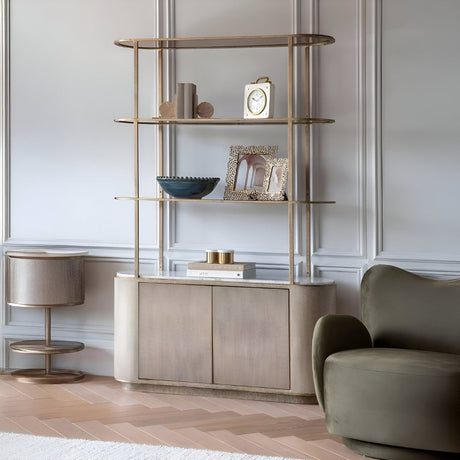 Tall open shelving unit with wood and metal framing, styled with decorative bowls, books, and accents above a low sideboard in a modern living space.
