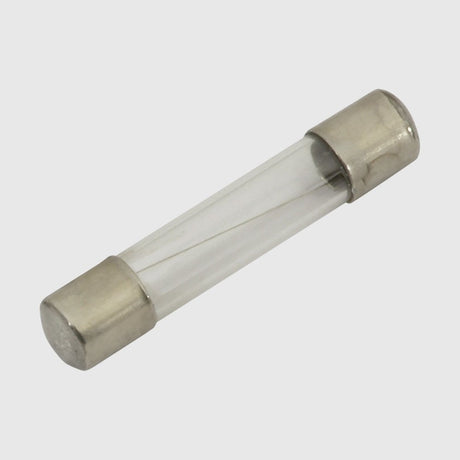 A white UK three-pin electrical plug with gold-colored prongs on a white background.