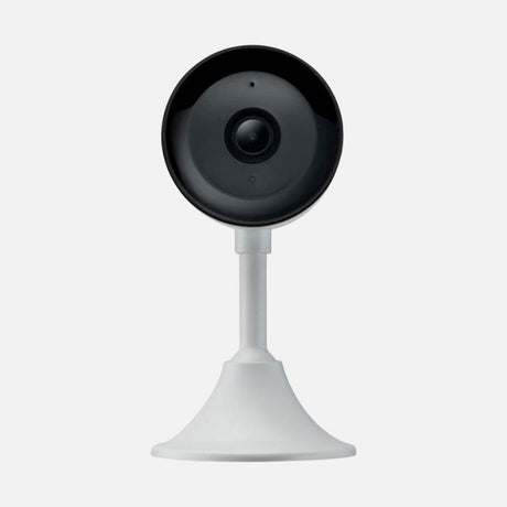 A compact security camera with a black front panel, the brand name Fort in the center, and a lens at the top. The device is oval-shaped, surrounded by a white casing.