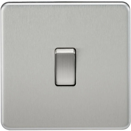 A brushed metal light switch with a minimalist design, centered on a plain surface.