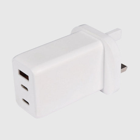 A white multi-port USB wall charger plug with three USB outputs.