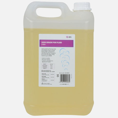 A large plastic container filled with light yellow fog fluid, labeled for use in stage and event machines.