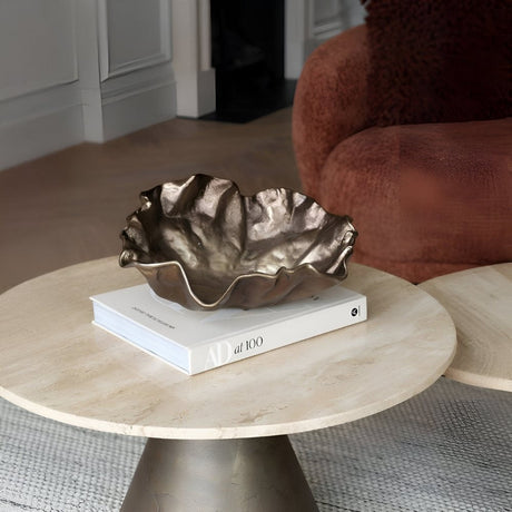 Chevron-patterned photo frame displayed on a modern black metal shelf, styled with a small decor piece beside it to create a clean and contemporary accent vignette.