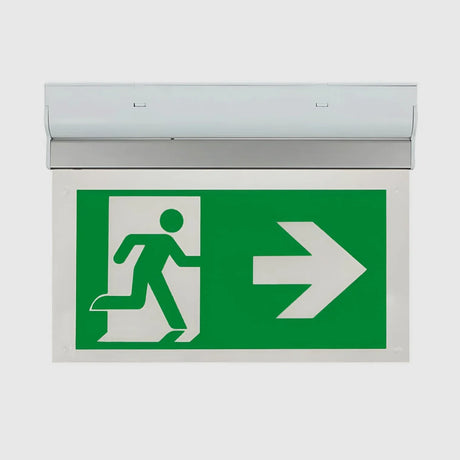 A green and white emergency exit sign with a running figure and an upward arrow, indicating the direction to evacuate. The sign is mounted on a white background.