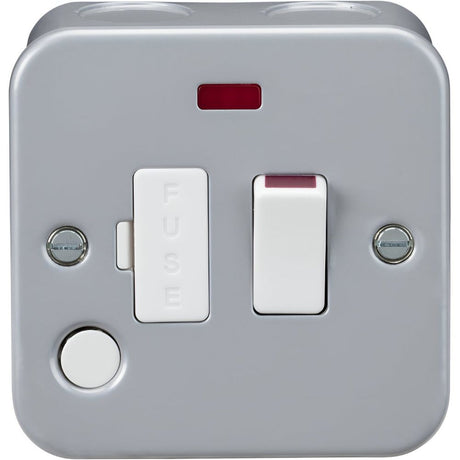 A metal double electrical outlet with two UK-style plug sockets, each with its own switch labeled ON in red. The unit has mounting holes on the sides and conduit entry points on top.