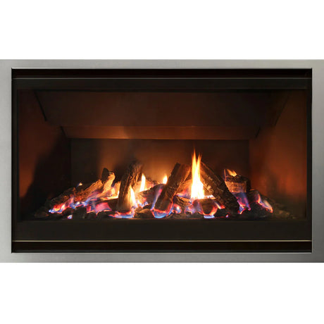 A modern gas fireplace with realistic logs and vibrant flames, set within a sleek, rectangular metal frame. The fire emits a warm, inviting glow against a dark background.