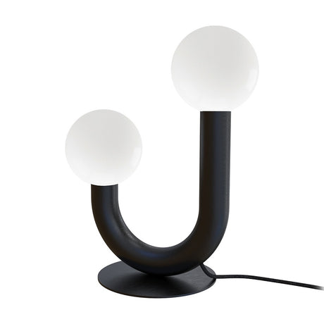 Rigoberta 2 Light Opal Glass Globe Table Lamp in matt black, curved U-shaped iron tube with two opal glass globes at uneven heights, round base, plain white background.