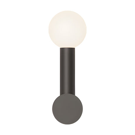 Rigoberta Mono wall light with a single opal glass globe atop a slim matt black iron tube, mounted on a round wall canopy against a plain white background.