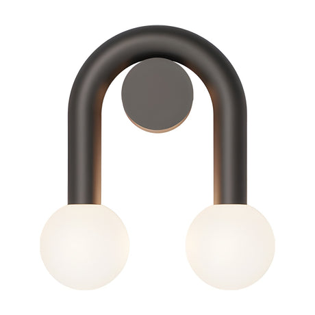 Rigoberta Super Curved Direct wall light in matt black iron, inverted U-shaped tube with round wall plate and two opal glass globes, shown on a plain white background.