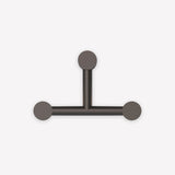 Rigoberta Trio wall light in matt black iron with a T-shaped frame holding three round opal glass discs, shown on a plain white background.