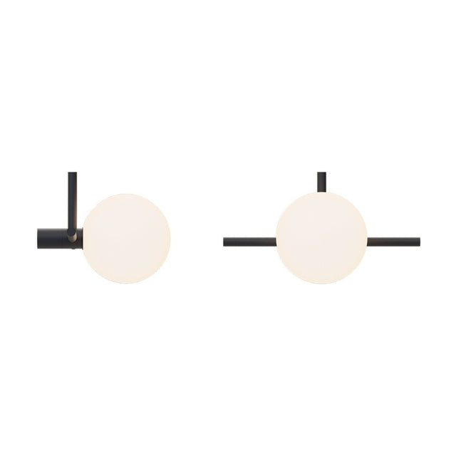 Roxanne East Opal Glass Globe Pendant Light in matt black, showing two angles with a round opal glass globe offset on a slim iron stem and bar, on a white background.