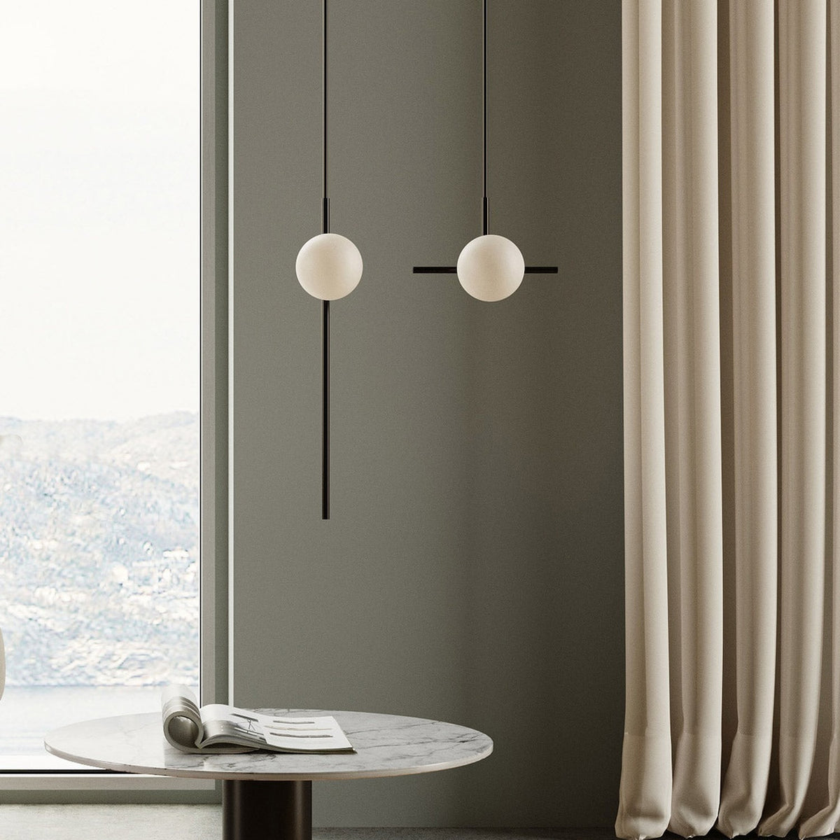 Roxanne North Opal Glass Globe Pendant Light in matt black, shown as two slim rod fixtures with single opal glass globes, hung in a living room beside a curtained window.