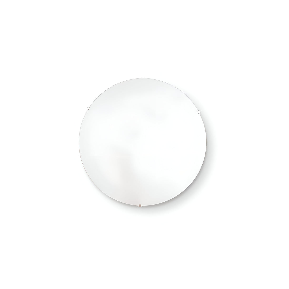 A round, minimalist mirror with a thin frame is mounted on a white wall, embodying a true minimalist aesthetic. The surface reflects light beautifully, creating a soft ambient glow that perfectly complements the Velum 2 Light Ceiling & Wall Light in White.