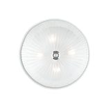The image portrays the Sapphire 4 Light Ceiling - Clear, which includes a textured clear glass cover accented with chrome metal. This design features symmetrical ridges radiating from the center for an elegant and modern appearance.
