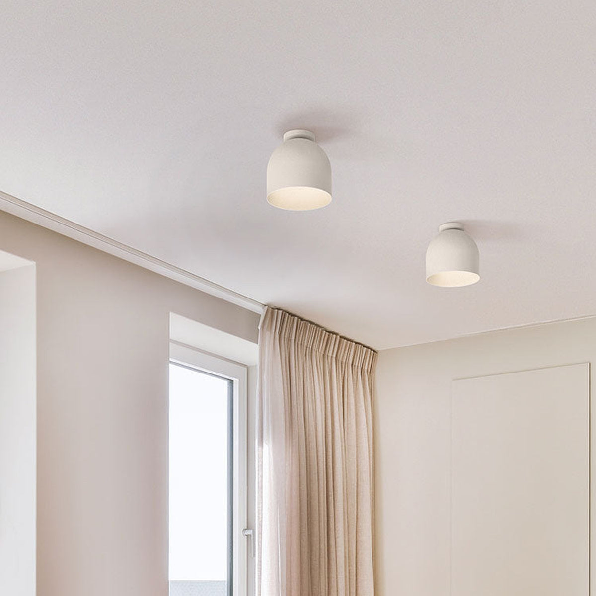 Rio Dome Flush Ceiling Light in matt white, two bell-shaped shades mounted flush to a hallway ceiling with neat round canopies.